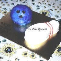 Bowling Ball & Pin This Bowling ball was baked in the 3D ball pan while the pin was baked a narrow snowman pan and trimmed down.