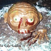 Zombie Cake This zombie was made out of the 3D ball pan & chocolate rolled buttercream for the skin!