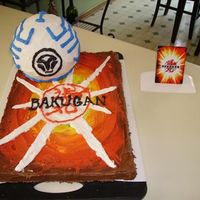 Bakugan Ball And Card Bakugan card is a chocolate chip cookie and the Bakugan ball is a cake.