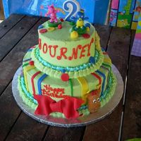 Backyardigans Birthday Backyardigans cake with buttercream and fondant. 3 of the characters are made from cookies.