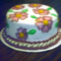 Nancy Yellow cake with peaches and cream filling, covered in fondant. This was my first attempt at brush embroidery. It didn't really turn...