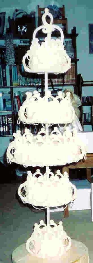 Cakes_033.jpg This is a dummy cake with royal icing decorations. It turned out fantastic but it was only my third wedding cake. I was not about to...
