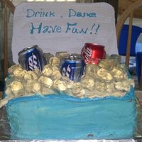 Cooler Cake This cake was made for an end of summer party. The ice cubes are clear jello, the cans are real with the bottom cut off and placed in the...