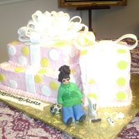 Birthday Presents View 2 Close up view of little girl Wii game and soccer ball. All made of fondant. Kudos to Cake Central for all the beautiful photos