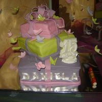 Gifts Boxes Cake This cake was for my daughter in her 15th birthday (in Brazil it`s like sweet sixteen in USA).She asked me many butterflies and the cakes...
