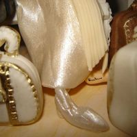 Tatoo.... Other view of the photo of Cute Couple. Here is a cute detail, a little tatoo (she has on a right foot) with her name"Talita" in...