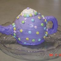 Tea Pot This was for a baby shower tea party. The handle and spout are made out of fondant that I shaped and let dry overnight.