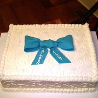 Birthday Bow An 11x18 sheetcake with Earlene's shelf stable cream cheese icing (tastes nothing like regular cream cheese icing). The bow is MMF. I...