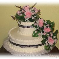 Wedding Cake For A Friend's Sister I did this cake for a friend's sister. Almond butter cake with bc icing and silk flowers.