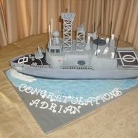 Anzac Class Frigate Took 4 days to complete! Mud cake covered with fondant and GP .Modeled on HMAS Adelaide.