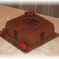 Texas Tech Groom's Cake Groom wanted the Seal of Texas Tech University on his cake. Used melted chocolate for the Seal and the double "T" emblems....