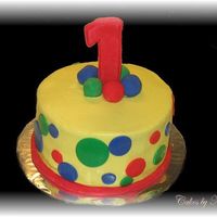 1St Birthday This cake was made for a first birthday. There were 36 matching cupcakes that went along with it. Yellow cake, bc icing, fondant accents.