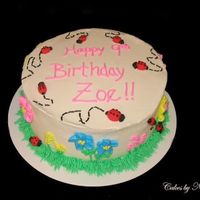Zoe Ladybug Birthday This cake was made for the daughter of a lady I work with. BC icing with fondant ladybugs.