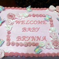 Coworker's Baby Shower I made this for my coworker's baby shower. It's white cake with chocolate marshmallow cream filling. Pink BC, Royal Icing flowers...