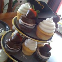 Graduation Cupcakes Chocolate Covered Strawberry and Vanilla Sugar cupcakes (Sorry for the crappy cell phone picture!!)