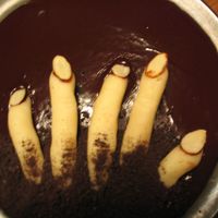 Zombie Cake The undead claw out of their chocolate graves!