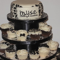 Damask Cupcake Stand I made these cupcakes and cake for a store Holiday party. The stand I made from wallpaper they had leftover from the store and covered it...