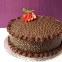 Gold Star This is Chocoalte fudge cake covered in Real chocolate w/Gold star coco-tranfer