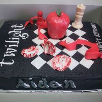 Twilight Birthday Cake This is my first attempt at a Twilight cake. My 9 yr old niece told me exactly what she wanted on the cake and how she wanted it.