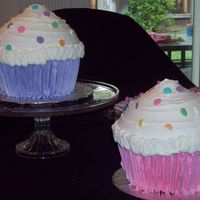 Twins Cupcake Party 2 giant Wilton cupcakes and 40 standard cupcakes ordered for a party. Very fun and simple. Buttercream frosting.