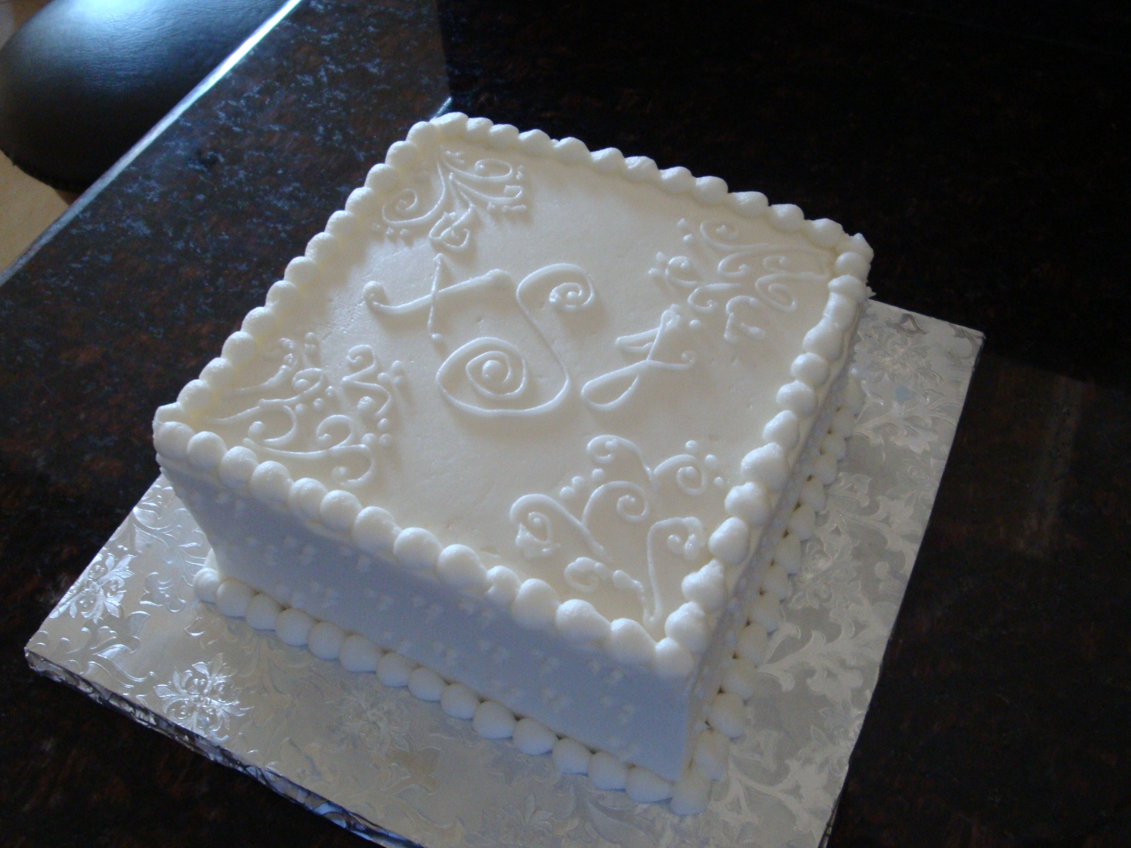 Janie & Xavier I made this cake for two friends celebrating their 1 year wedding anniversary. I was priviledged enough to make their wedding cake last...