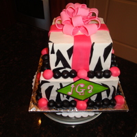 Flirty @ Forty Made this flirty zebra cake for a woman's fortieth birthday. Cake is a vanilla almond cake with vanilla buttercream.