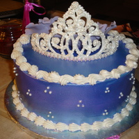 Tiara Cake Royal icing tiara with sugar pearls. Airbrushed with amerimist lavender pearl color. Gumpaste fantasy flowers