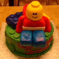 Lego Man Cake Got this idea from someone here on cakecentral & it was a huge hit. 10" vanilla cake iced in vanilla bc. Legos & Man were Rice...