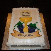 Bobby's Communion Made this for my godson's first communion. It's alternating layers of chocolate and vanilla cake. The chalise, host, and banner...