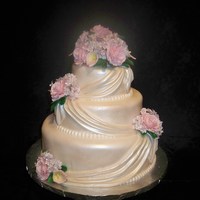 Rose And Callas This is a copy of a cake the MOB gave me. She wanted it as close to the picture as possilbe with ivory fondanct and pink rosses, callas,...