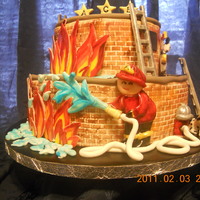 Ace Will Be A Fireman Just Like Daddy Fondant covered cake with brick impression. Gumpaste fireman, flames, fire hydrant, ladders, beagle dalmation (I tried for a straight up...