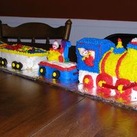 Train Cake I used the Wilton cake pan and then used mini bread pans for the fright cars. This was for my baby's 1st birthday. He got the cake...