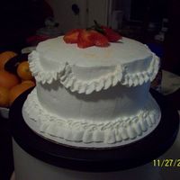 Another Three Milk Cake This is a 6' inch three milk cake with fresh strawberries and whipped cream.