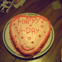 First Valentine's Day Cake This is my first V-Day cake I made for my family. My little sister insisted I do these decorations so I couldn't do what I wanted :(....