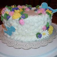 Course 2 Grand Finale This is my grand finale cake for Wilton's Course 2. It is a yellow cake with BC icing and royal icing flowers. I was so very proud...