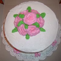 Wilton Course 1 Final Cake This was my final cake for course 1. It should of had white dots on it also but I am not good at those. White cake with BC.