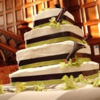 Simple Stacked Square Wedding Cakes These stacked rounded square wedding cake was made for one of my friends. The sides were covered with aubergine and lime green ribbon and...