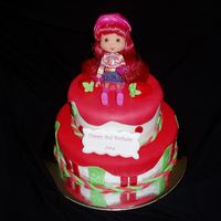 Strawberry Shortcake this is my 1st photo on cakecentral, hopefully more to come. Choc mud cake covered in rtr. strawberries made out of sugar paste.