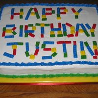 Lego Cke This is for my son's 6th birthday party. The Lego is made out of fondant. It is a cherry cake with vanilla BC. Thanks for looking!