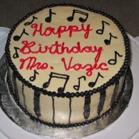 Piano I made this cake for a fellow teacher. She also teaches piano on the side...hence the theme :)