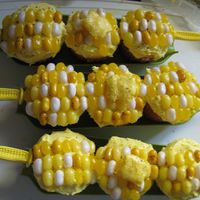 Corn On The Cob Cupcakes Made these for a friend's birthday. Found on the Martha Stewart web site. Kernels are different shades of jelly bellies, the butter is...