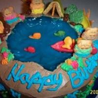 Camping Cake Pic 2 This pic shows a little more detail. It shows the sun in the back right hand corner.