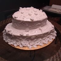 My First "real" Wedding Cake This is my first wedding cake for a real person and a real wedding. It felt good to finish but it was fun to work on. It also felt good to...