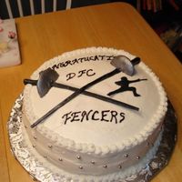 Fencing Cake This was tough. I wasn't as creative as I'd like but it was hard to come up with the idea. I made the foil (swords) out of...