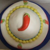 30Th Birthday Fiesta Sombrero Pound cake, buttercream, fresh strawberry filling, fondant top layer and chili pepper decor.