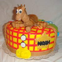 Toy Story 3 sided Toy Story cake, Woody, Buzz, Jessie and Bullseye on top