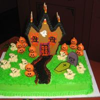 Scouts Halloween Party This is a sheetcake with a ginger bread house. I made this for my 3 Grandsons' Boy Scout Party. All the kids really likes it.