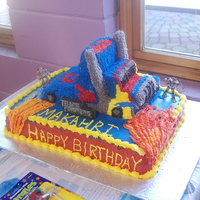 Transformers Optimus Prime This is my first 3-D Cake. Heck my first real cake making besides the ones I've done in the Wilton Classes. I got my idea from a cake...
