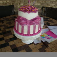 Calla Birthday 9 and 6 in buttercream with fondant accents. Lemon and raspberry cake with raspberry filling.