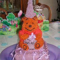 Pooh Birthday Cake We made this cake for my son's first birthday using the Winnie the Pooh cake pan. (The color wasn't this dark in person.)